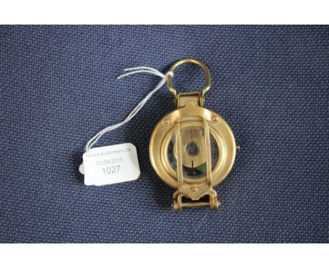 A brass cased compass 