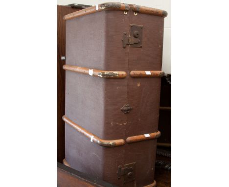 An early 20th century travelling trunk, with beech bound sides