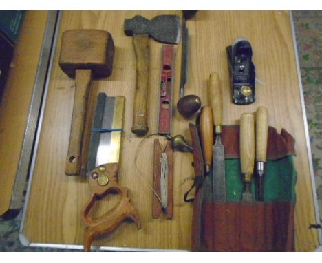 collection of vintage wood working tools to include mallet, chisels, mini plane, plumb bob, drawer knife, side axe, spirit le