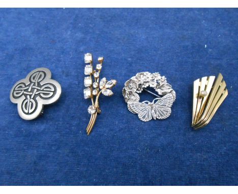 silver brooch, pewter celtic brooch, silver brooch and 2 yellow metal brooch