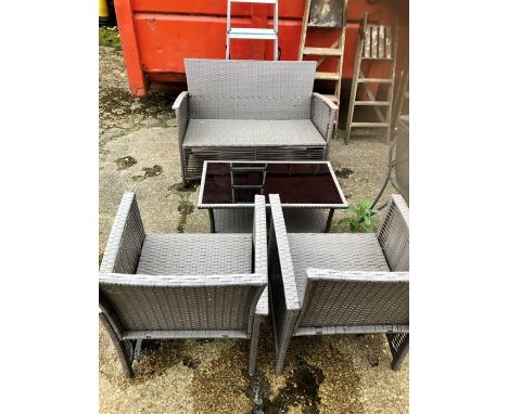 Garden conservatory sofa , 2 chairs and table with cushions ( faded )