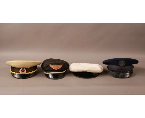 4 Naval Caps, to include 1 USSR Naval Cap, 1 USN Cap, 1 Harley Davidson Applied Badge Cap and an Unspecified Yacht Cap.Reserv