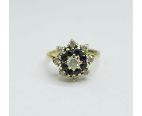 A 9ct gold cluster ring, 3.1g, O 