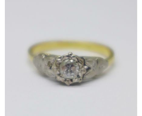 An 18ct gold and white metal set diamond ring, 2.4g, L 