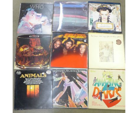 Twenty-four LP records and 12" singles, mainly 1980's including Rod Stewart, Status Quo, The Who, Japan, etc. 