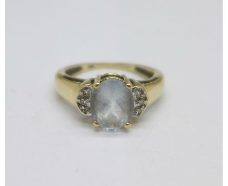 A 9ct gold and stone set ring, 2.9g, M 