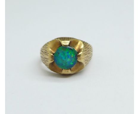 A 9ct gold and doublet opal ring, 5g, M, edge of stone chipped 