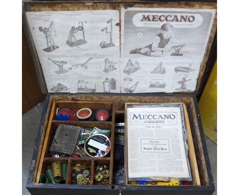 A pine trunk with a collection of early Meccano, a Meccano B key and a 1938 Meccano magazine 