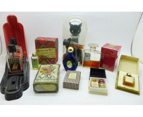 Vintage perfumes and a Bakelite stand for nail varnish and remover 