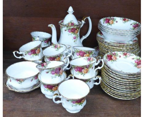 Royal Albert Old Country Roses china:- coffee pot, thirteen cups, fourteen saucers, eighteen side plates, four cereal bowls, 