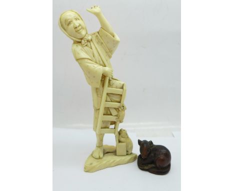 A carved ivory figure of an old lady, a rat and a cat, a/f, 15.5cm, and a netsuke 