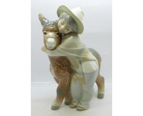 A Lladro figure, boy with donkey, 21cm 