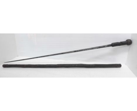 An early 19th Century swordstick, with decorated blade and leather scabbard, circa 1820 