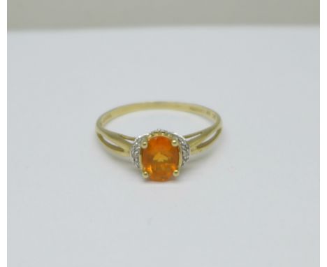 A 9ct gold, fire opal and diamond ring, 1.7g, T 