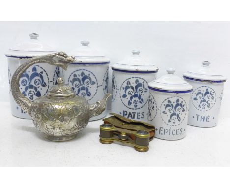 A set of five graduated enamel storage jars, a pair of theatre glasses and an oriental metal teapot 