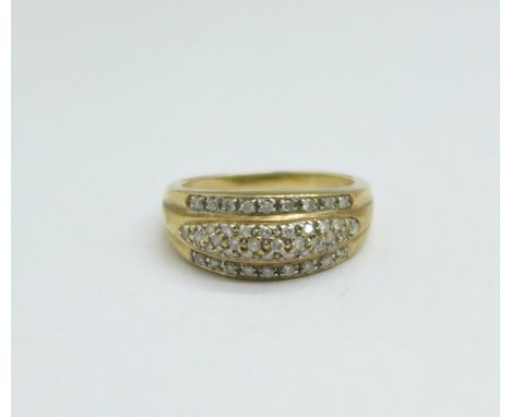 A 9ct gold and diamond ring, 4.9g, Q 