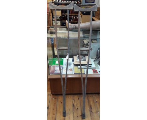 British WWI/II Hospital Issue under-arm Crutches made from wood with leather arm fittings and rubber furrels, both are in exc