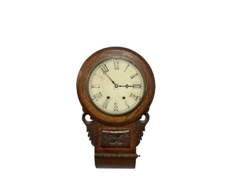 American - 8-day mahogany drop dial wall clock c 1890, with an inlaid wooden dial bezel, carved ear pieces and pendulum viewi