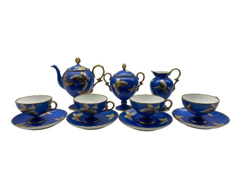 Noritake tea set for four persons, decorated with Butterflies on blue ground 