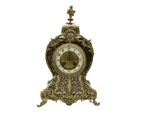 French - late 19th-century 8-day ebony and faux tortoiseshell mantle clock,  waisted shaped case  with brass inlay raised on 