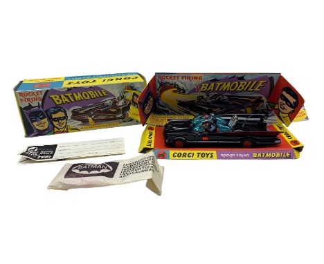 Corgi Toys rocket firing Batmobile No.267, in black gloss, rubber tyres with gold hubs and red bats, blue tinted windscreen, 