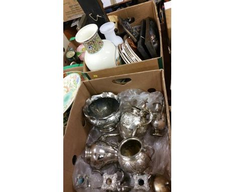 Plated tea service and a box of assorted