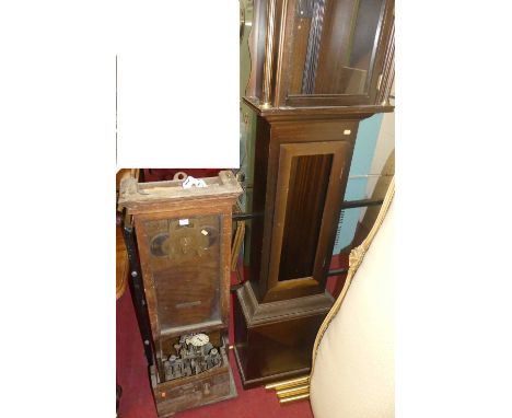 An early 20th century oak clocking-in/clocking-out clock; together with a reproduction mahogany longcase clock case only (2)C