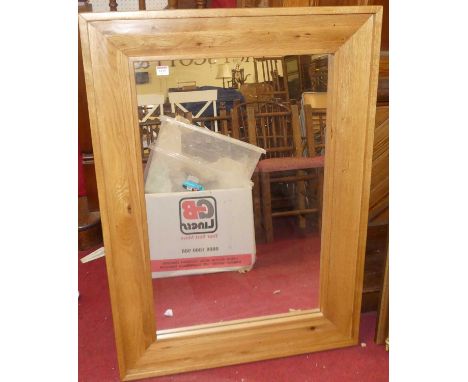 A contemporary light oak rectangular wall mirror, 111 x 80cm 