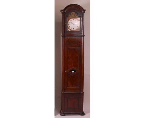 A mid-19th century continental walnut longcase clock, having unsigned convex white enamel Roman dial within an embossed brass