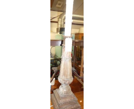 A carved limed oak pedestal floor light, h.100cm (including fitting)