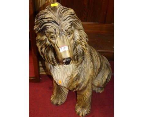 A large ceramic model of a seated poodle, h.74cm 