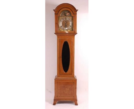 J.H. Dixon Hurst - an Edwardian mahogany and inlaid longcase clock, having 12" arched brass dial, the arch with rolling moon 