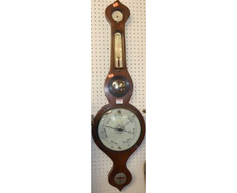 A 19th century rosewood onion topped four dial wheel barometer, the silvered lower scale signed W.N. Telford Chester, h.92.5c