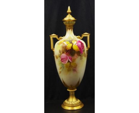 Royal Worcester signed twin handle lidded urn signed by Jarman, handpainted blooming rose flowers, heightened in gilt, taperi