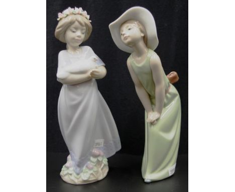 Two various Lladro ceramic figures including: Girl in Green dress, and Girl with Dove, each marked to base, (height 23cm appr