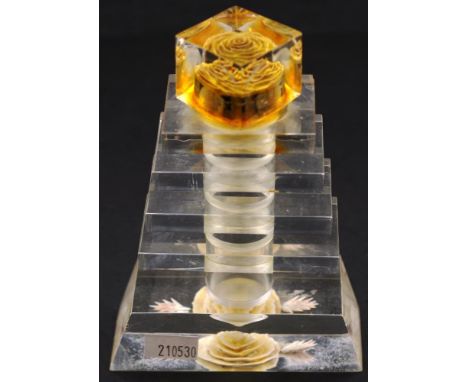 Retro lucite flower perfume bottle in a graduated step form, height 13cm approx