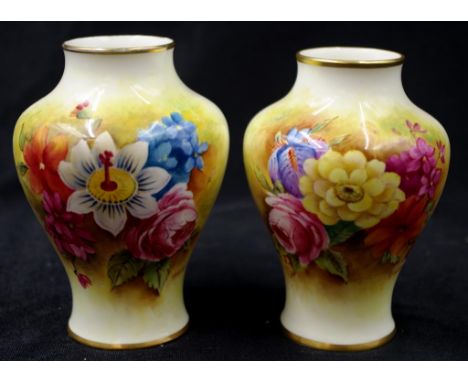 Pair of Royal Worcester signed floral posy vases both with handpainted floral decoration and signed S.Huntley, height 10.5cm 