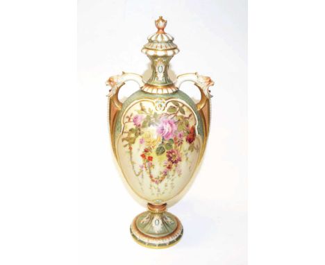 Large Royal Worcester blush ivory lidded urn Circa 1906, with ornate floral spray and gilt decoration, twin handles with in r