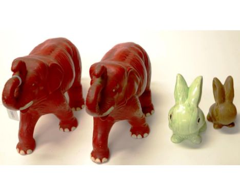 Pair of large Sylvac Elephant figures each  red ceramic figure of a standing elephant with trunk raised, marked to bases and 
