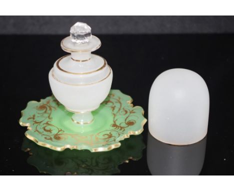Antique opaline glass perfume bottle ring stand white opaline egg form with gilt rim decorated perfume bottle with internal s