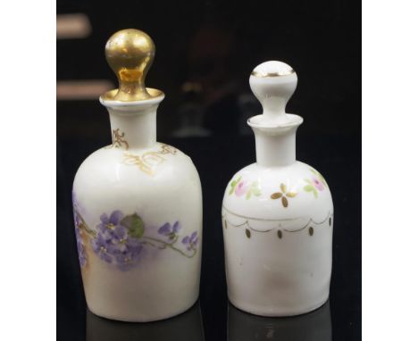 Limoges (France) ceramic perfume bottle with floral decoration and gold highlights, height approx 14cm, some wear to stopper 