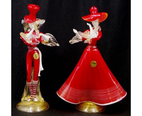 Good pair Murano Art Glass figures including: depicting a male, and a female dancer, each in red clothing, with aventurina de