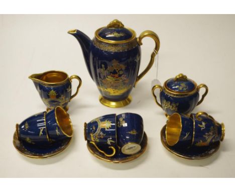 Carlton Ware bleu royale "Pagoda" coffee set to include coffee pot, cream &amp; sugar and six each cups and saucers. One sauc