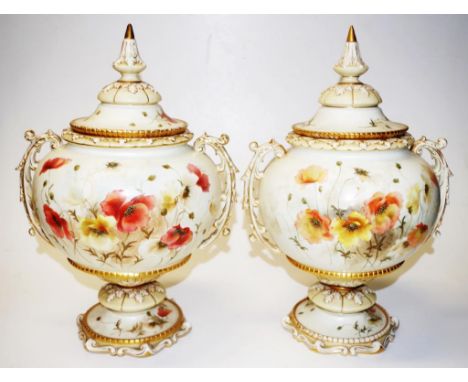 Pair of Royal China Works Worcester lidded jars blush ivory with handpainted blooming poppy sprays, twin handles on pedestal 