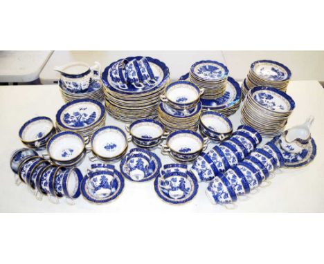 Extensive Booths 'Real Old Willow' dinner service including: 12 soup coupes and saucers, 6 coffee cups and saucers, 15 teacup