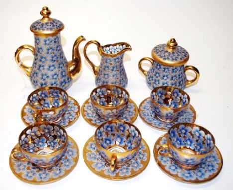 Antique hand painted glass coffee set with gilding and floral decoration, comprising of a coffee pot (17cm high approx), milk