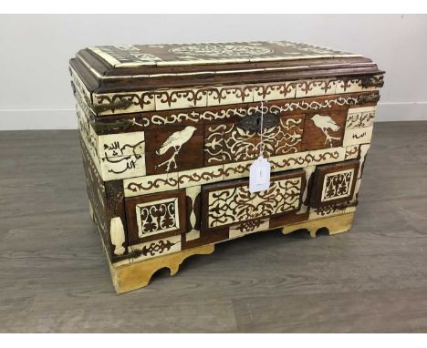 OTTOMAN / ISLAMIC CASKET, 19th century, with bone inlay featuring fauna, arabesque scrolls and Arabic calligraphic verses, on