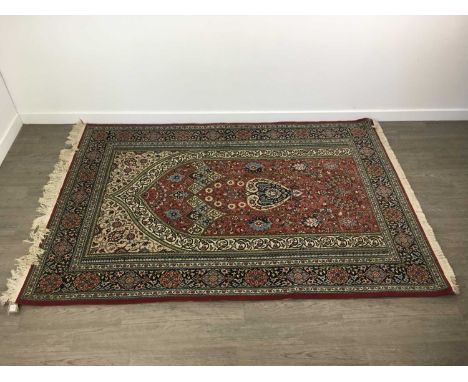 PERSIAN ARCH &amp; LANTERN RUG,on red, navy and cream grounds, 202 x 139cm