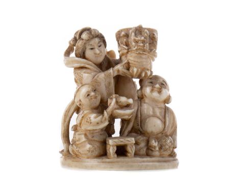 JAPANESE IVORY NETSUKE,Tokyo School, Meiji Period (1868-1912), carved as a group of four figures performing a ceremony, signe