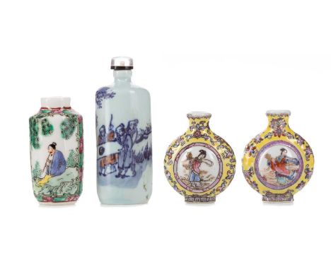 GROUP OF FOUR CHINESE CERAMIC SNUFF BOTTLES,the tallest with figural decoration and retaining stopper, 9cm high (4)